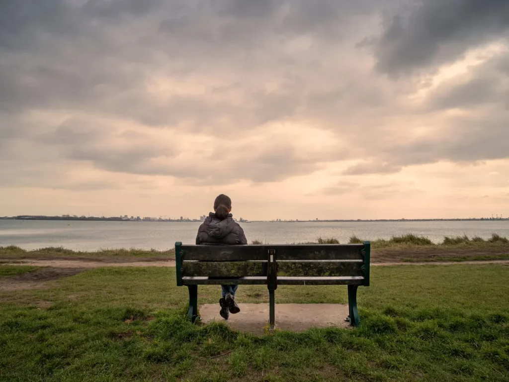 Woman looking into the ocean